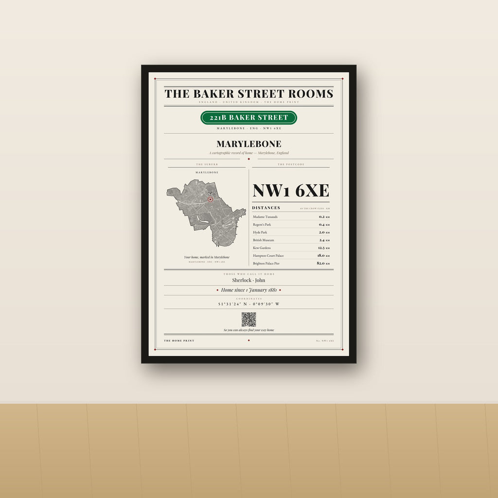 The Home Print in a black frame, styled on a wall