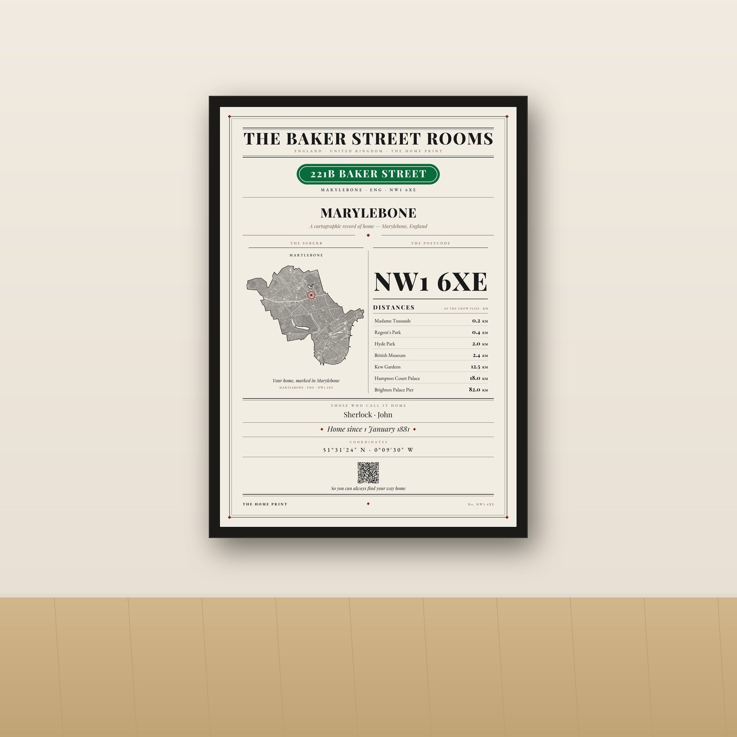 The Home Print in a black frame, styled on a wall